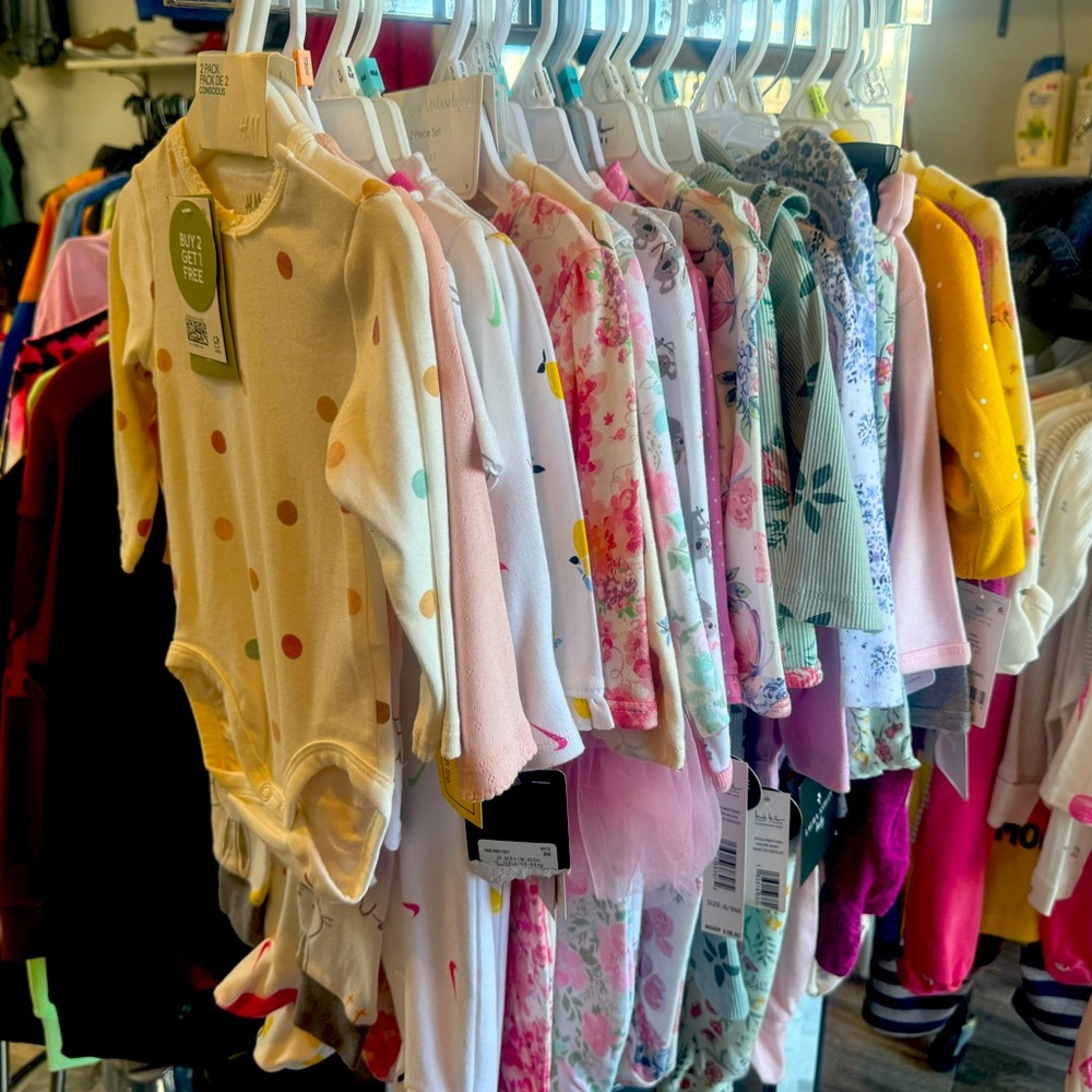 19 pieces for $150.00 all brand new never worn girls onesies